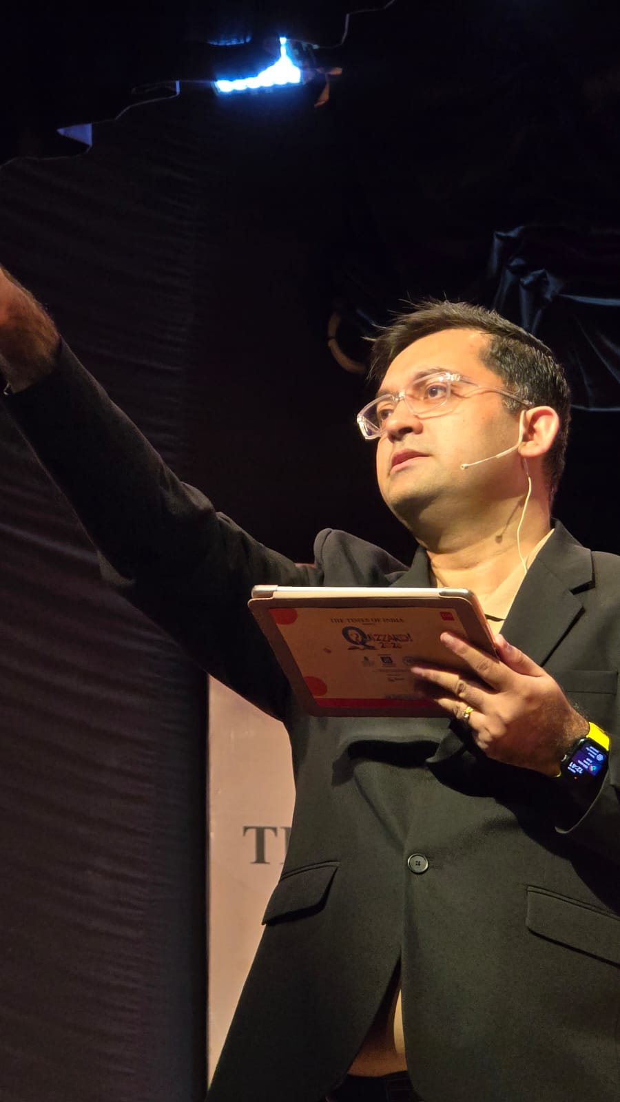 Alekhya on stage at quiz event